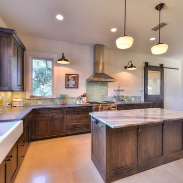 Dark Cabinets contrast gorgeously with the light granite countertops and walls