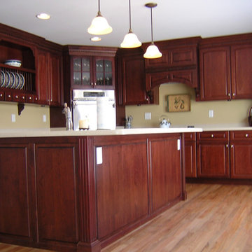 Dark Cherry Traditional Custom Kitchen with Wine and Plate Rack in Baltimore, MD