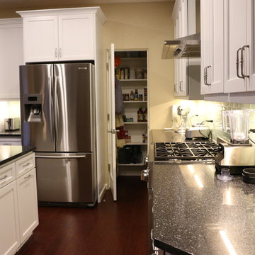 Dark Counters With White Cabinets