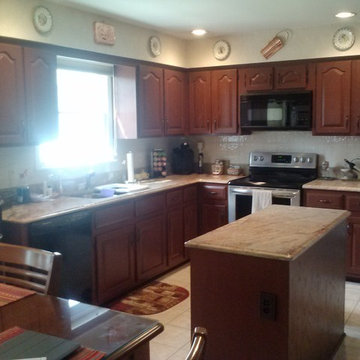 Dark Decorative Paint Finish on Wooden Kitchen Cabinets in Egg Harbor Township,