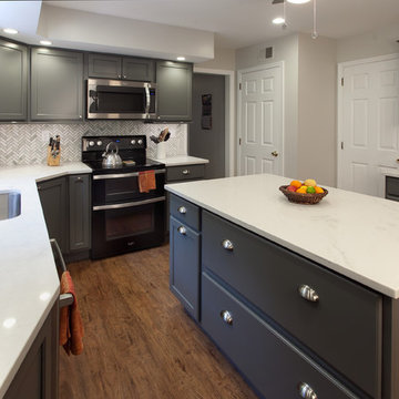 Dark Gray Cabinetry Makes the White Pop