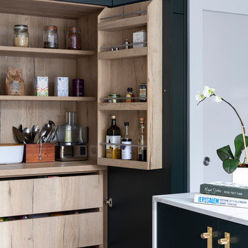 Dark Green Doors and Oak Shelving