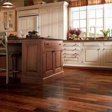 Dark Hardwood Floors in Greet & White Kitchen