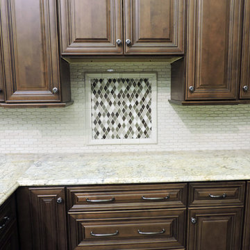 Dark Oak Kitchen With Mosaic Accent Tile