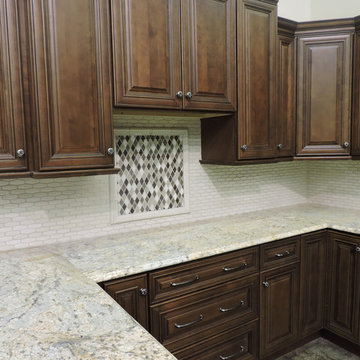 Dark Oak Kitchen With Mosaic Accent Tile