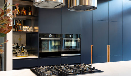 Room of the Week: Dark Blue and Metallics Make a Striking Kitchen