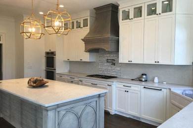Kitchen - traditional kitchen idea in Atlanta with an island