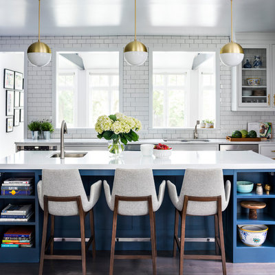 Large transitional l-shaped medium tone wood floor and brown floor eat-in kitchen photo in New York with a double-bowl sink, shaker cabinets, blue cabinets, quartz countertops, white backsplash, ceramic backsplash, stainless steel appliances and an island