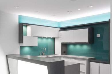 Design ideas for a medium sized contemporary u-shaped open plan kitchen in Salt Lake City with a submerged sink, flat-panel cabinets, white cabinets, engineered stone countertops, green splashback, glass sheet splashback, white appliances and a breakfast bar.