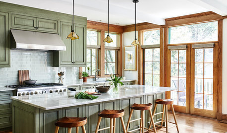 Distressed Green Cabinets Bring Weathered Charm to a New Kitchen