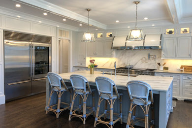 Inspiration for a transitional u-shaped eat-in kitchen remodel in Newark with a single-bowl sink, beaded inset cabinets, white cabinets, marble countertops, white backsplash, marble backsplash, stainless steel appliances, an island and white countertops