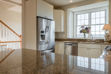 Example of a small classic u-shaped dark wood floor eat-in kitchen design in Other with a double-bowl sink, flat-panel cabinets, white cabinets, granite countertops, multicolored backsplash, stone slab backsplash, stainless steel appliances and a peninsula