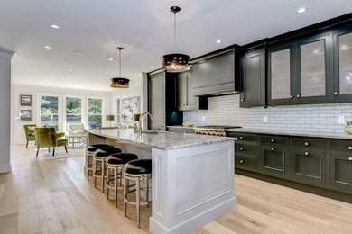 Large transitional galley light wood floor and beige floor eat-in kitchen photo in DC Metro with an undermount sink, beaded inset cabinets, gray cabinets, marble countertops, gray backsplash, terra-cotta backsplash, paneled appliances and an island
