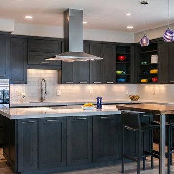 Denver Kitchen Remodel with Island Cooktop and Stainless Hood Above