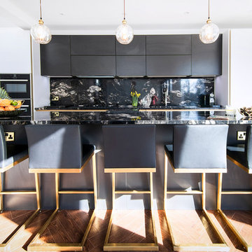 Designer Kitchen with contrasting colours and gold trim