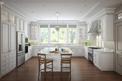 This is an example of a large classic u-shaped open plan kitchen in San Francisco with an island.