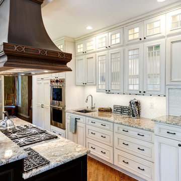 Distressed White Cabinets and Glass Display Cabinets