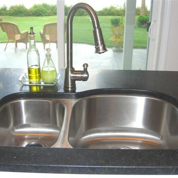 Double bowl stainless steel sink in black granite