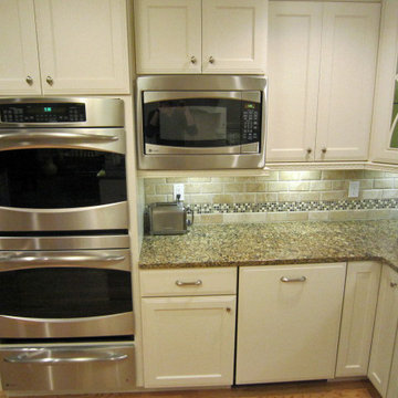 Double Ovens and Green Cabinets