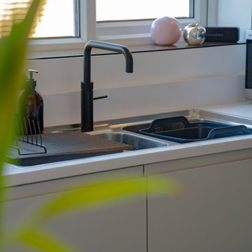 Dove Grey & Graphite Modern Kitchen with Blanco Zeus Extreme Quartz worktops