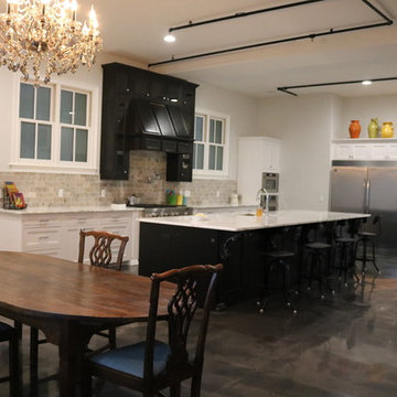 Downtown Loft Kitchen -  Contrasting Black island and Black hood cabinet