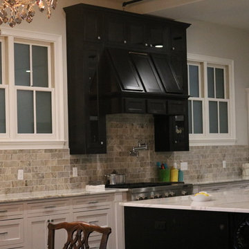 Downtown Loft Kitchen - Hood cabinet with glass doors