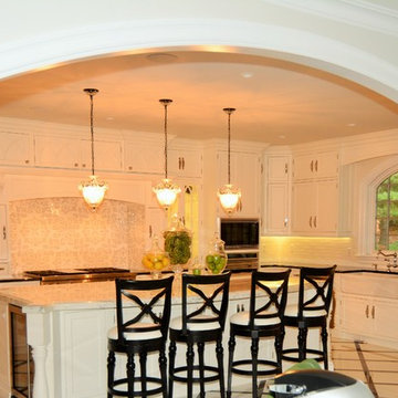 Dramatic White Traditional Kitchen with Black Accents