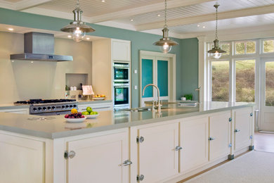 This is an example of an eclectic kitchen in Other with stainless steel appliances.