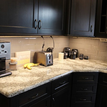 DuraSupreme Peppercorn Kitchen With Cambria Tops and Black Stainless Appliances