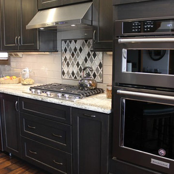 DuraSupreme Peppercorn Kitchen With Cambria Tops and Black Stainless Appliances
