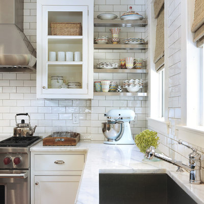 Inspiration for a timeless kitchen remodel in Providence with beaded inset cabinets, stainless steel appliances, a single-bowl sink, white cabinets, marble countertops, white backsplash and subway tile backsplash