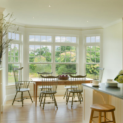 Eat-in kitchen - traditional eat-in kitchen idea in Providence with beige cabinets
