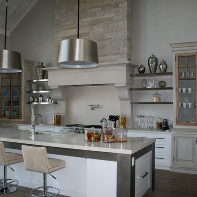 Mountain style kitchen photo in Toronto with stainless steel appliances and beige countertops