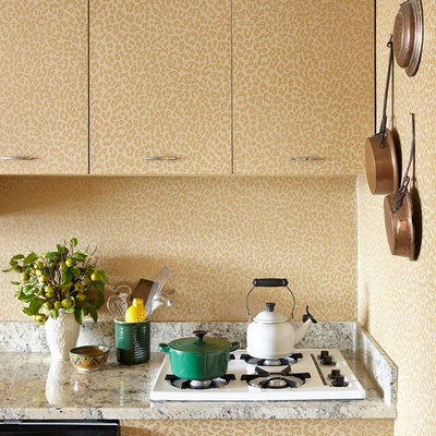 Eclectic kitchen photo in New York with flat-panel cabinets