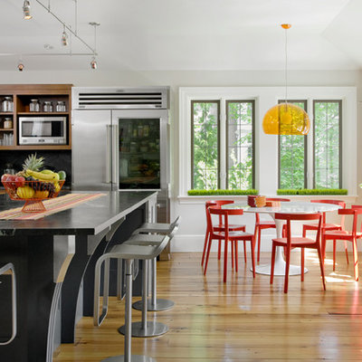 Elegant eat-in kitchen photo in Boston with soapstone countertops