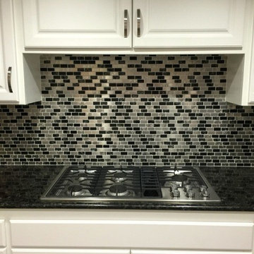 Eden Mosaic Tile Installations: Stainless Steel And Crackled Glass Tile