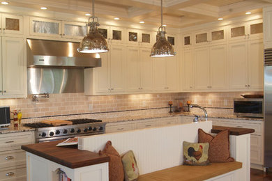 Kitchen - traditional kitchen idea in Charlotte with stainless steel appliances
