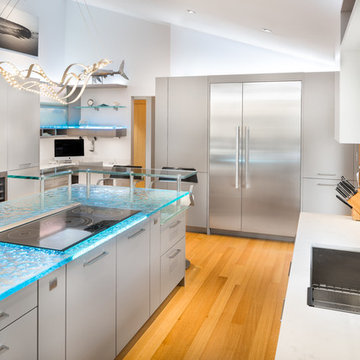 Electric range inside cast glass countertops in a luxury California residence
