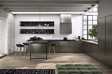 Design ideas for a medium sized urban l-shaped open plan kitchen in Other with distressed cabinets and a breakfast bar.