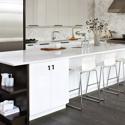 Kitchen - modern l-shaped kitchen idea in Toronto with an undermount sink, flat-panel cabinets, white cabinets, white backsplash, stainless steel appliances and marble backsplash