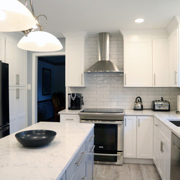 Elegant white kitchen with grey island