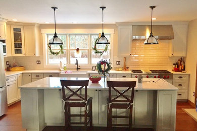 Example of a transitional kitchen design in New York