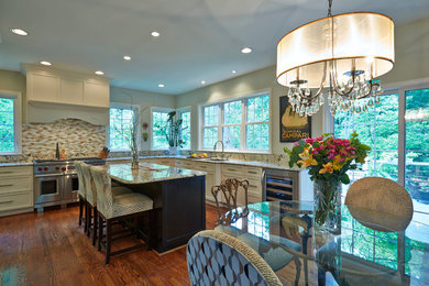 Eat-in kitchen - large transitional l-shaped dark wood floor eat-in kitchen idea in Baltimore with an undermount sink, shaker cabinets, white cabinets, granite countertops, multicolored backsplash, mosaic tile backsplash, stainless steel appliances and an island