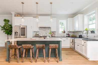 Inspiration for a coastal medium tone wood floor and brown floor kitchen remodel in Orlando