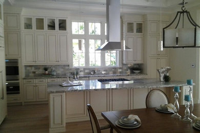 Example of a cottage chic kitchen design in Miami