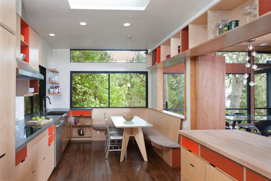 Mountain style dark wood floor eat-in kitchen photo in San Francisco with flat-panel cabinets and light wood cabinets