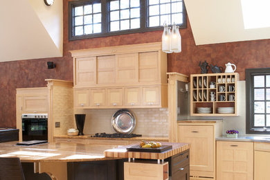 Inspiration for a huge craftsman single-wall cork floor open concept kitchen remodel in Chicago with an integrated sink, light wood cabinets, stainless steel countertops, yellow backsplash, ceramic backsplash, paneled appliances, two islands and shaker cabinets