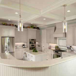 Photo of a large transitional u-shaped kitchen pantry in Orlando with a drop-in sink, shaker cabinets, grey cabinets, recycled glass benchtops, white splashback, glass sheet splashback, stainless steel appliances, porcelain floors, multiple islands, grey floor and multi-coloured benchtop.