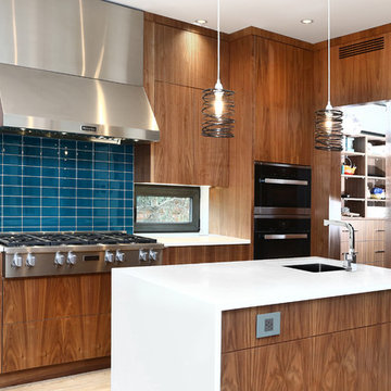 Expansive Orange/Blue/Walnut Kitchen