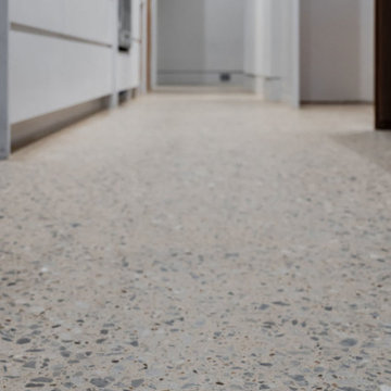 Exposed Aggregate Polished Concrete Floor in Luxury Residential Kitchen
